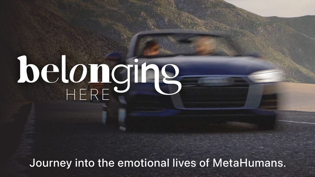 Title card for behind-the-scenes extras for Belonging: HERE, featuring ablue convertible speeding down a mountain road. A man and boy sit in the front seats.